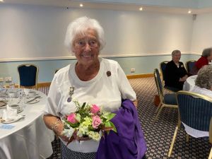 Betty Selfe at Afternoon Tea wearing her Magarette Golding Award