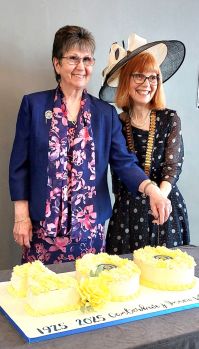 Canterbury President and Assn Editor Di cut the cake