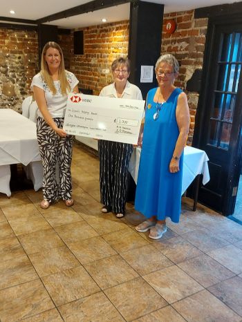 Presentation of the big cheque to Emily Anderson of 'Louie's Helping Hands'