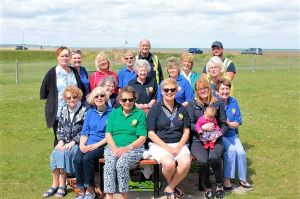 The Club at the bench and table with the workmen 