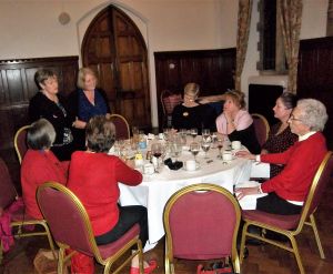 Ladies on the Top table listening to the speakers